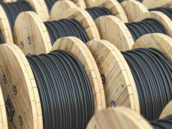 Warehouse with wooden coil wire electric cable. 3d illustration